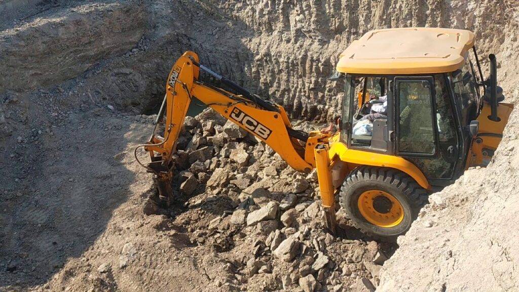 Excavation was being done with JCB to build the highway