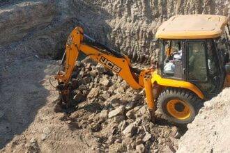 Excavation was being done with JCB to build the highway