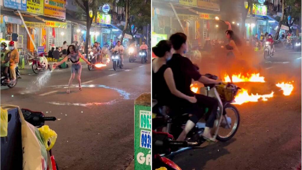 Girl did stunt by creating a circle of fire on the road