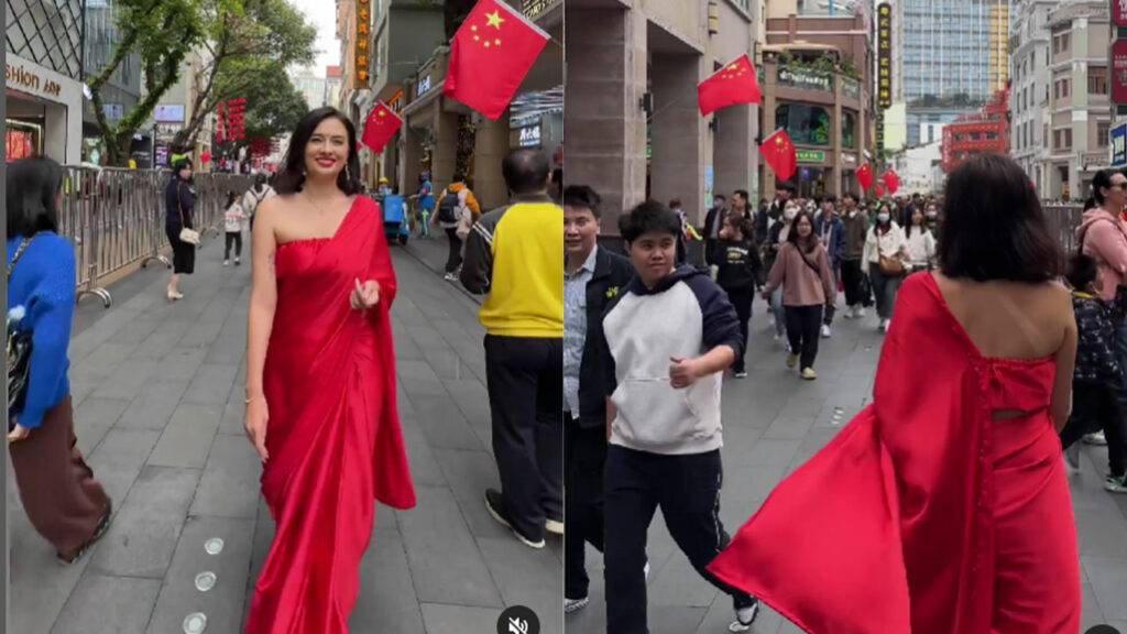 Girl wearing saree walks on the streets of China