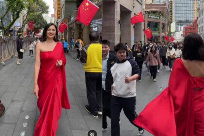 Girl wearing saree walks on the streets of China