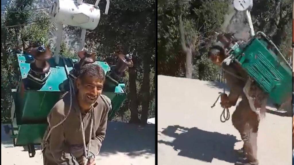 A man climbing carrying a 340 kg transform