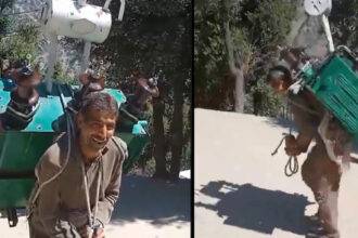 A man climbing carrying a 340 kg transform