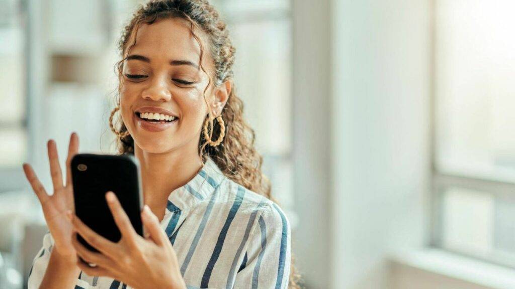 Social media connection and woman typing on a phone for communication Girl